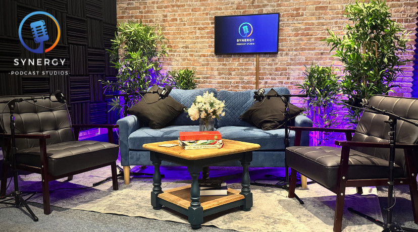 Sofa + Black Chairs + Brick Wall